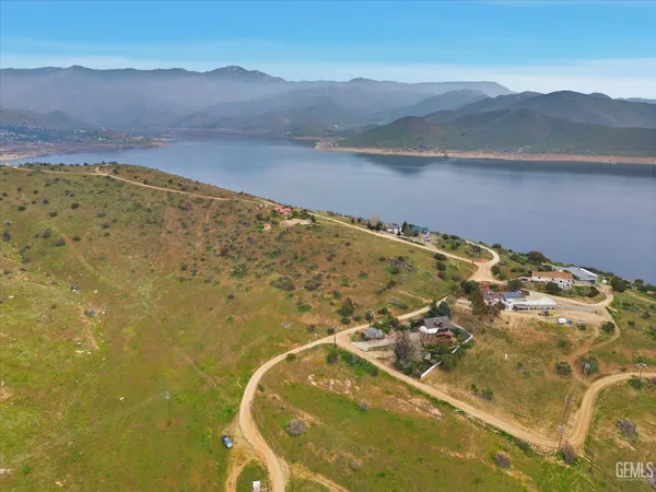 a bed room with a bed and a chandelier