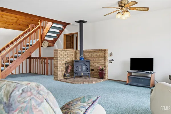 a kitchen with a sink and a window