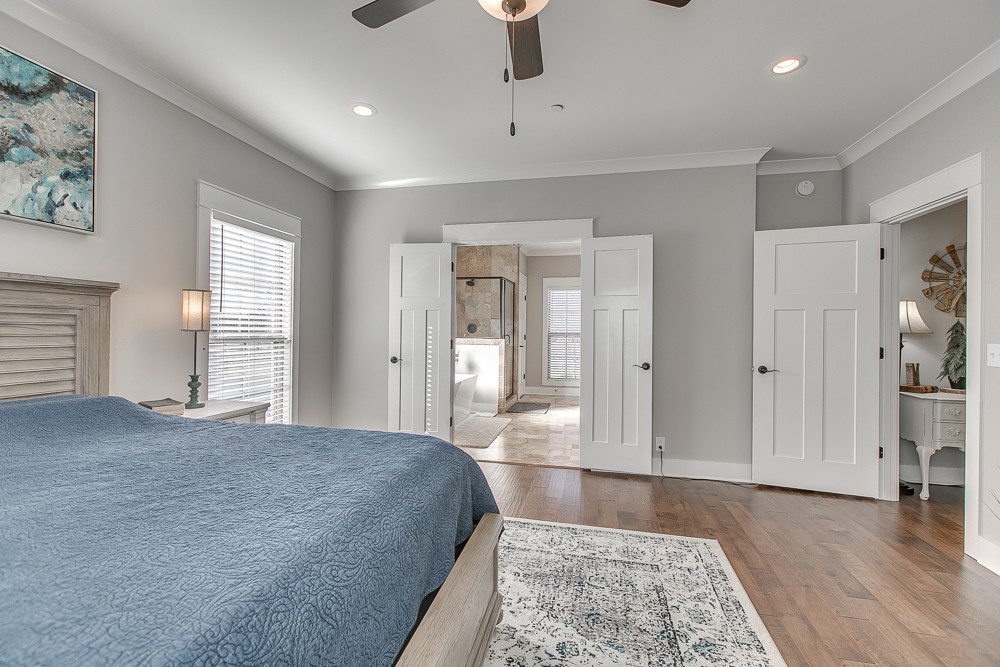9630 Mona Road Murfreesboro, TN 37129 - Photo 12 of 39 a spacious bedroom with a bed and wooden floor