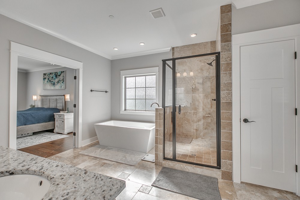 9630 Mona Road Murfreesboro, TN 37129 - Photo 15 of 39 a bathroom with a bathtub and a shower