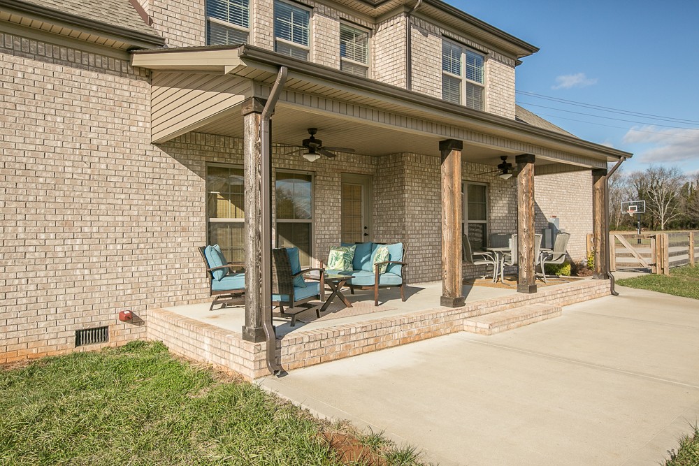 9630 Mona Road Murfreesboro, TN 37129 - Photo 35 of 39 a view of a building with sitting area