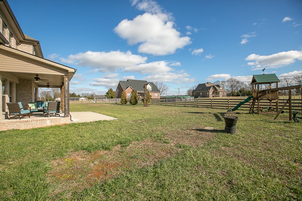 9630 Mona Road Murfreesboro, TN 37129 - Photo 36 of 39 a swimming pool with outdoor seating and yard