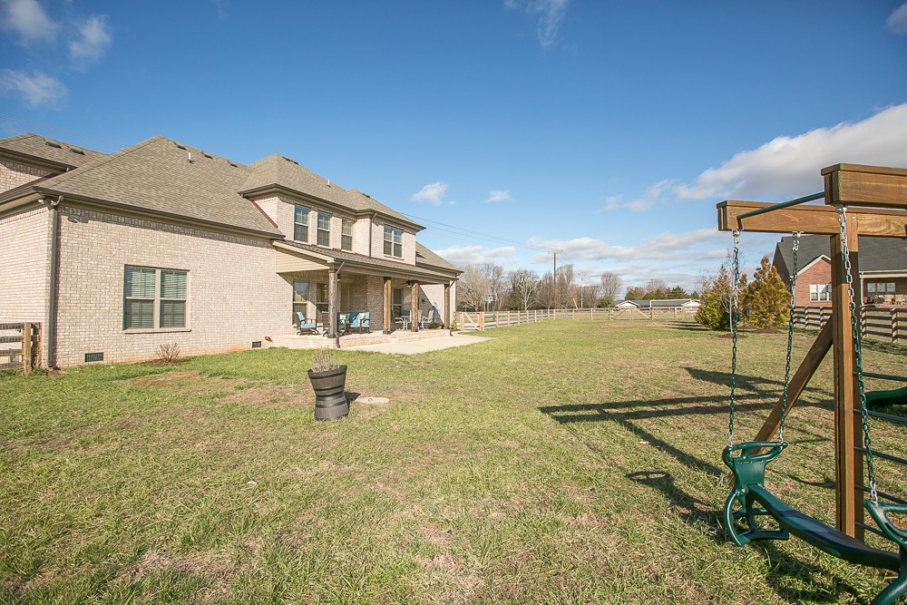 9630 Mona Road Murfreesboro, TN 37129 - Photo 37 of 39 a swimming pool with outdoor seating and yard