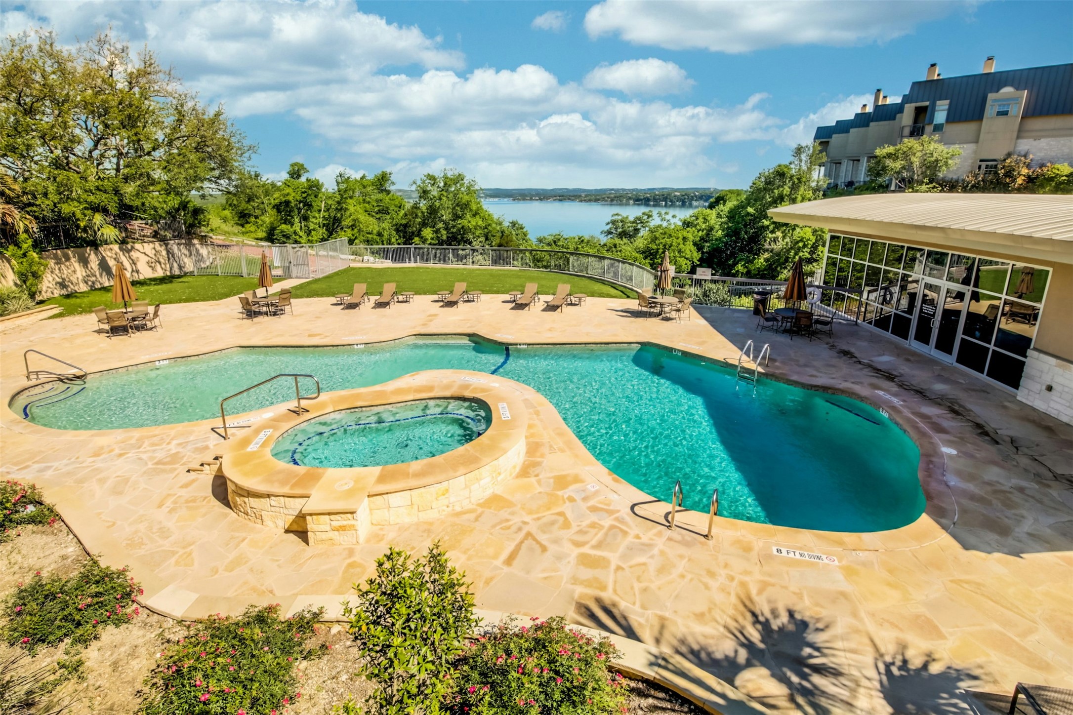 2918 Ranch To Market Road 620, Unit W219 Austin, TX 78734 - Photo 32 of 35 Sparkling community pool and spa with panoramic lake views - your private oasis for relaxing and entertaining.