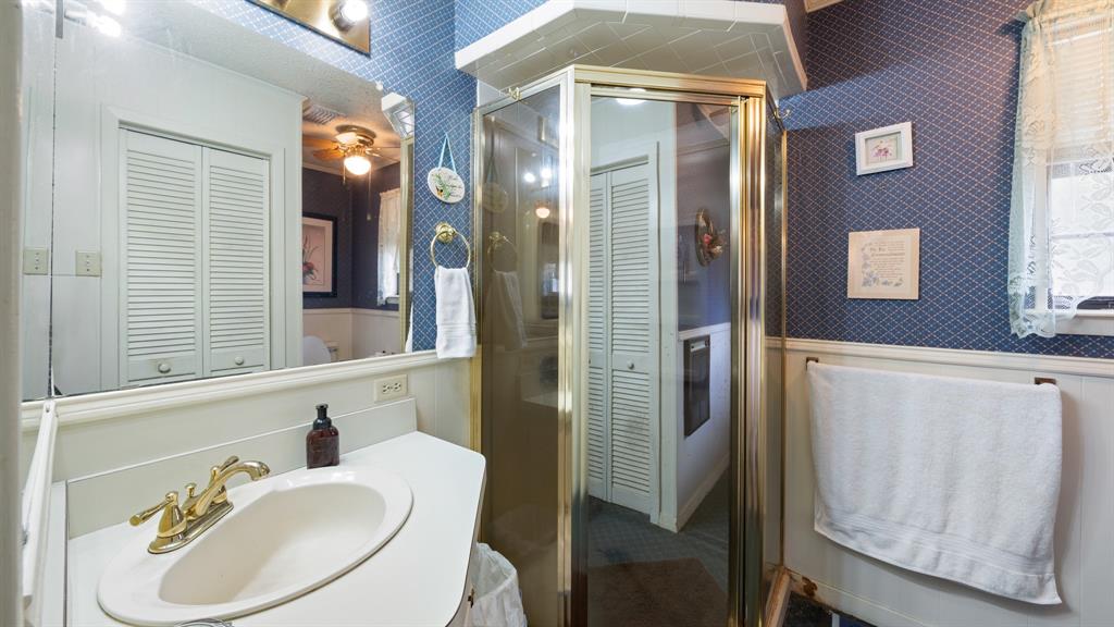 460 VZ County Road Canton, TX 75103 - Photo 15 of 24 a bathroom with a sink and a mirror