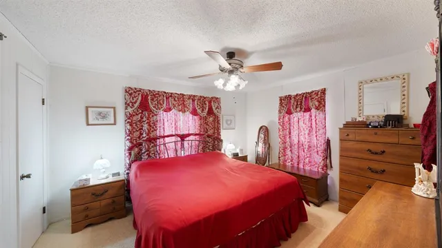 a bedroom with a bed and a closet