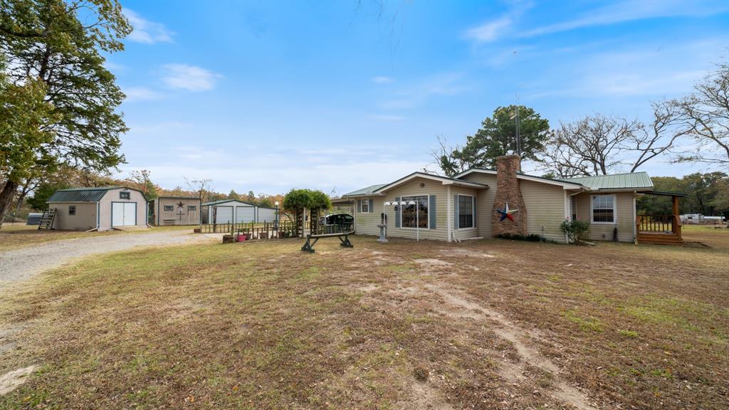 460 VZ County Road Canton, TX 75103 - Photo 2 of 24 a front view of a house with a yard and trees
