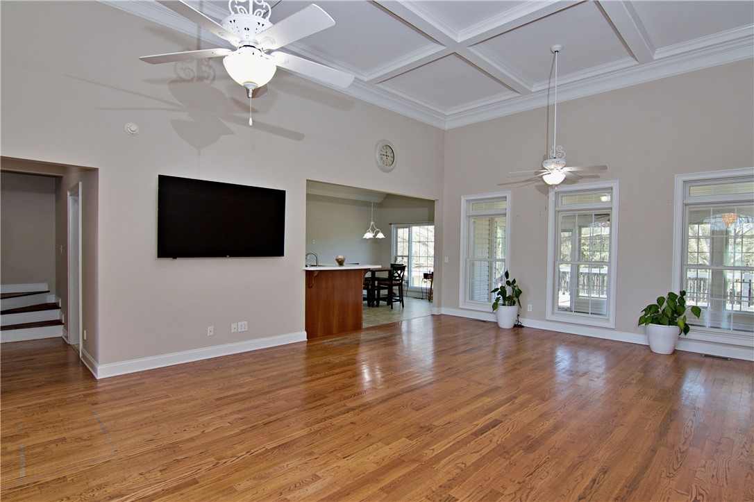 7893 Athens Road Carnesville, GA 30521 - Photo 7 of 50 This expansive living space features hardwood floors and abundant natural light.