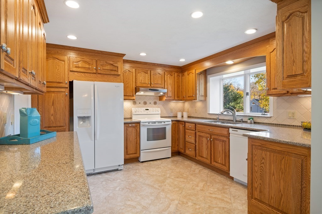 16 Westwood Road Lexington, MA 02420 - Photo 13 of 41 a kitchen with a sink stainless steel appliances and cabinets