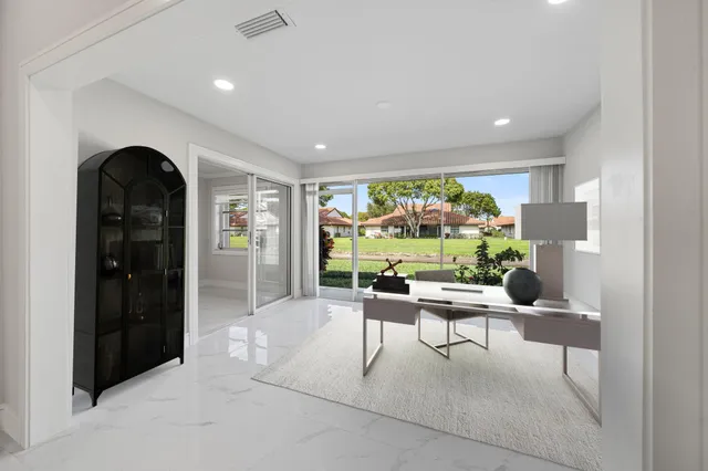 a view of a livingroom with furniture window and outside view