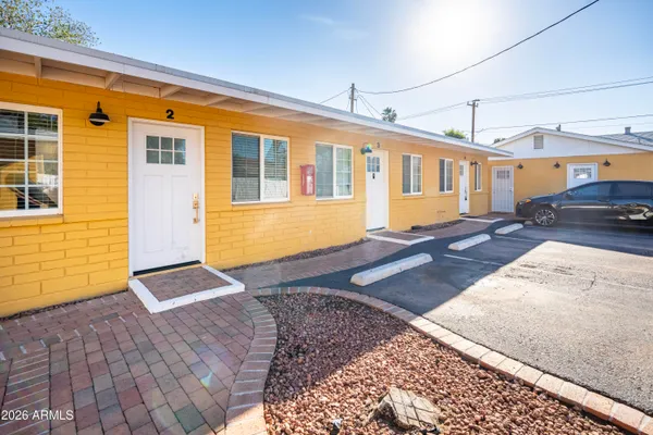 a front view of a house with yard