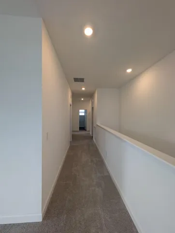 a view of a livingroom and a window