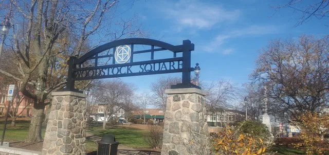a view of a street with sign board