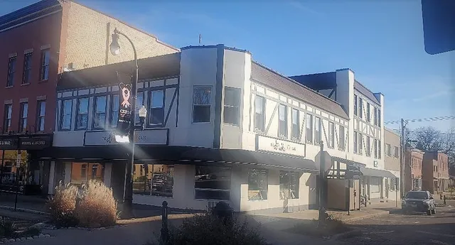 a front view of a building with glass windows