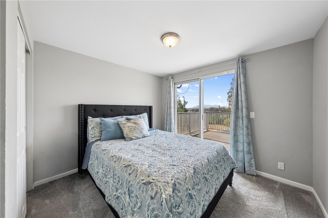 35825 Meadow Ridge Road Temecula, CA 92592 - Photo 47 of 75 a large bed sitting in a bedroom next to a window