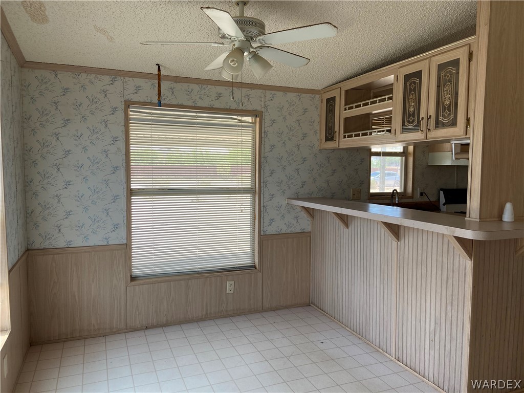 740 South Elfrida Road Golden Valley, AZ 86413 - Photo 17 of 47 a view of an empty room with a window