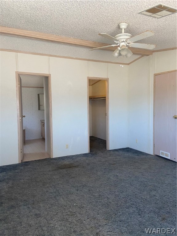 740 South Elfrida Road Golden Valley, AZ 86413 - Photo 38 of 47 a view of an empty room with a chandelier fan