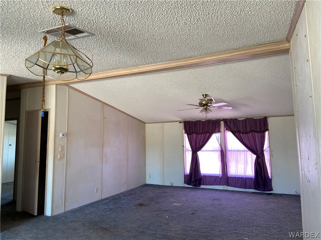 740 South Elfrida Road Golden Valley, AZ 86413 - Photo 10 of 47 a view of empty room with a window