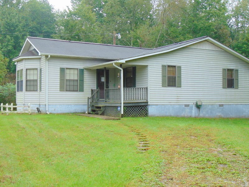 985 Rome Road Lancing, TN 37770 - Photo 1 of 11 a view of a house with pool