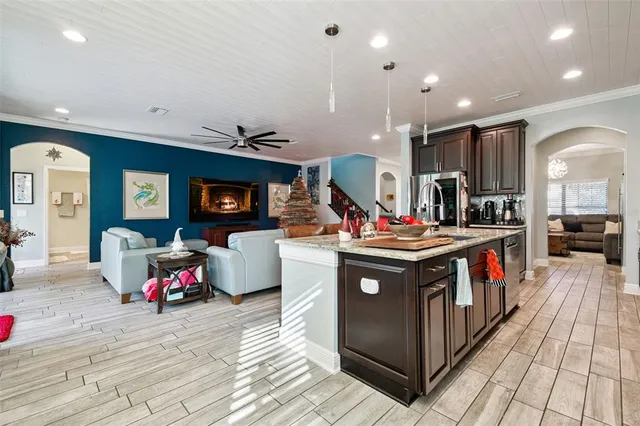 a open kitchen with stainless steel appliances granite countertop lots of counter top space