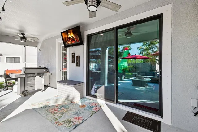 a view of a house with a yard porch and sitting area