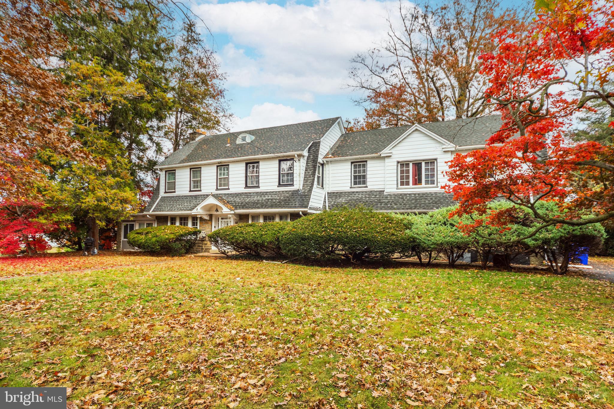 817 Ashbourne Road Cheltenham, PA 19012 - Photo 3 of 38 a front view of a house with garden