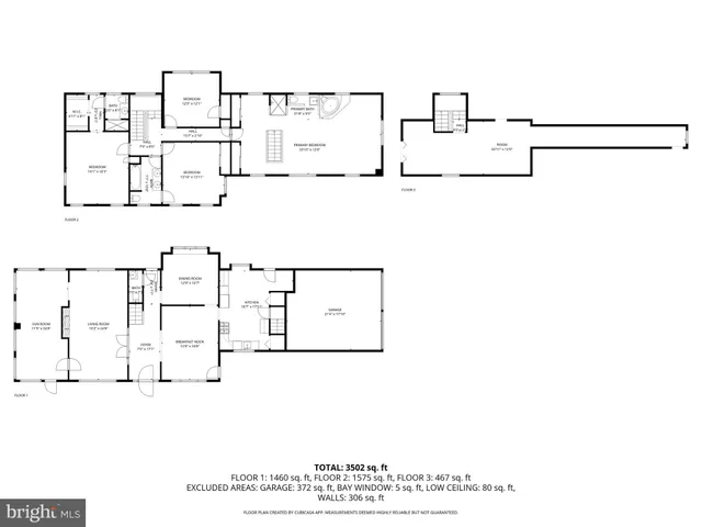 a black and white photo of a living room