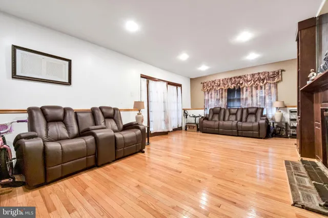 a living room with a couch and a flat screen tv