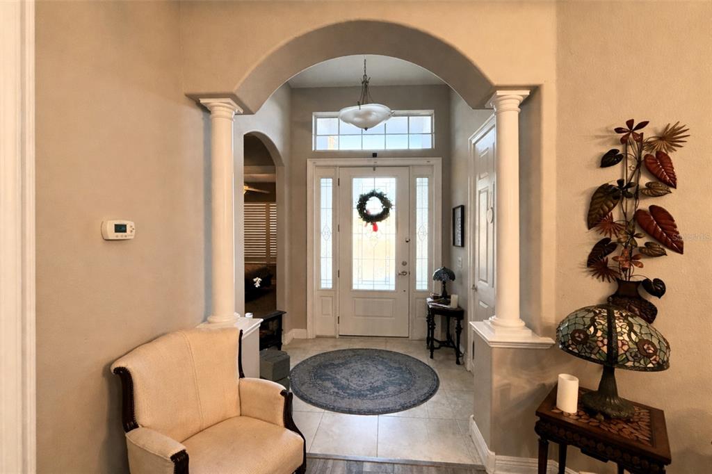 10127 Tria Drive Weeki Wachee, FL 34613 - Photo 15 of 33 a bathroom with a sink a toilet and a mirror