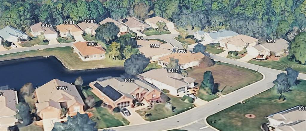 10127 Tria Drive Weeki Wachee, FL 34613 - Photo 29 of 33 an aerial view of a house with outdoor space