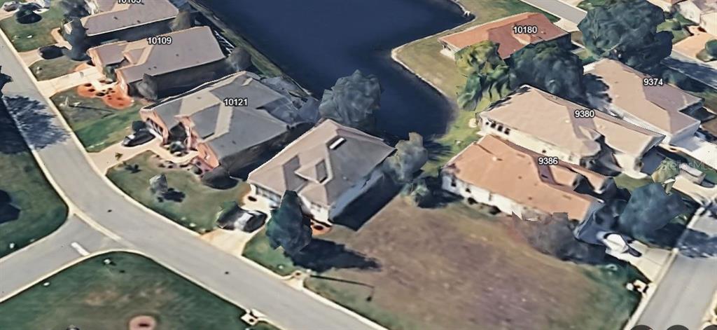 10127 Tria Drive Weeki Wachee, FL 34613 - Photo 6 of 33 an aerial view of a house with a yard