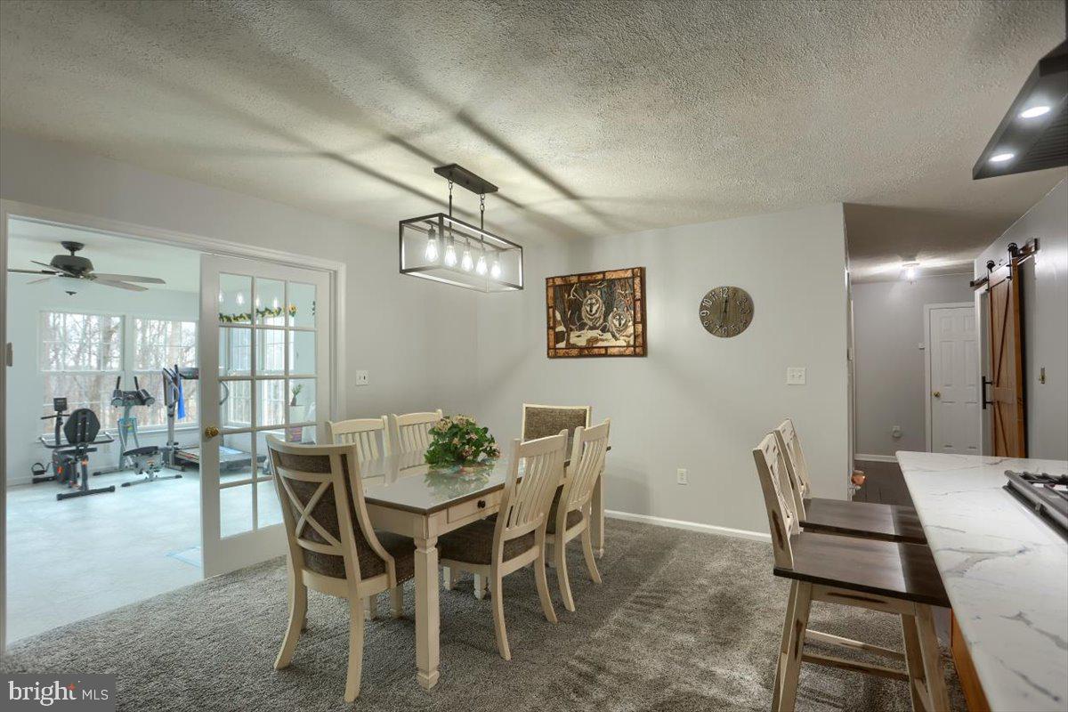 7666 Hickory Road Stewartstown, PA 17363 - Photo 12 of 57 Dining room off the kitchen