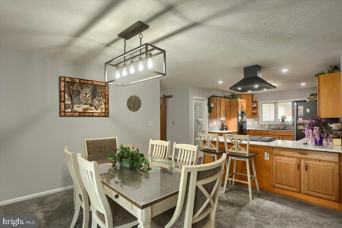 7666 Hickory Road Stewartstown, PA 17363 - Photo 13 of 57 Dining room off kitchen
