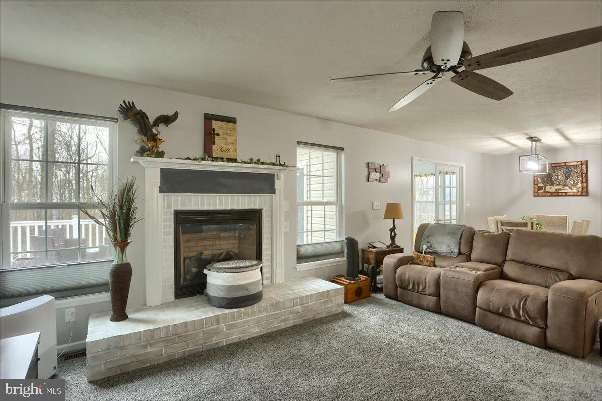 7666 Hickory Road Stewartstown, PA 17363 - Photo 33 of 57 Living room with gas fireplace
