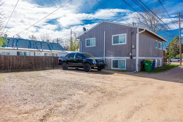 a car parked in front of a house