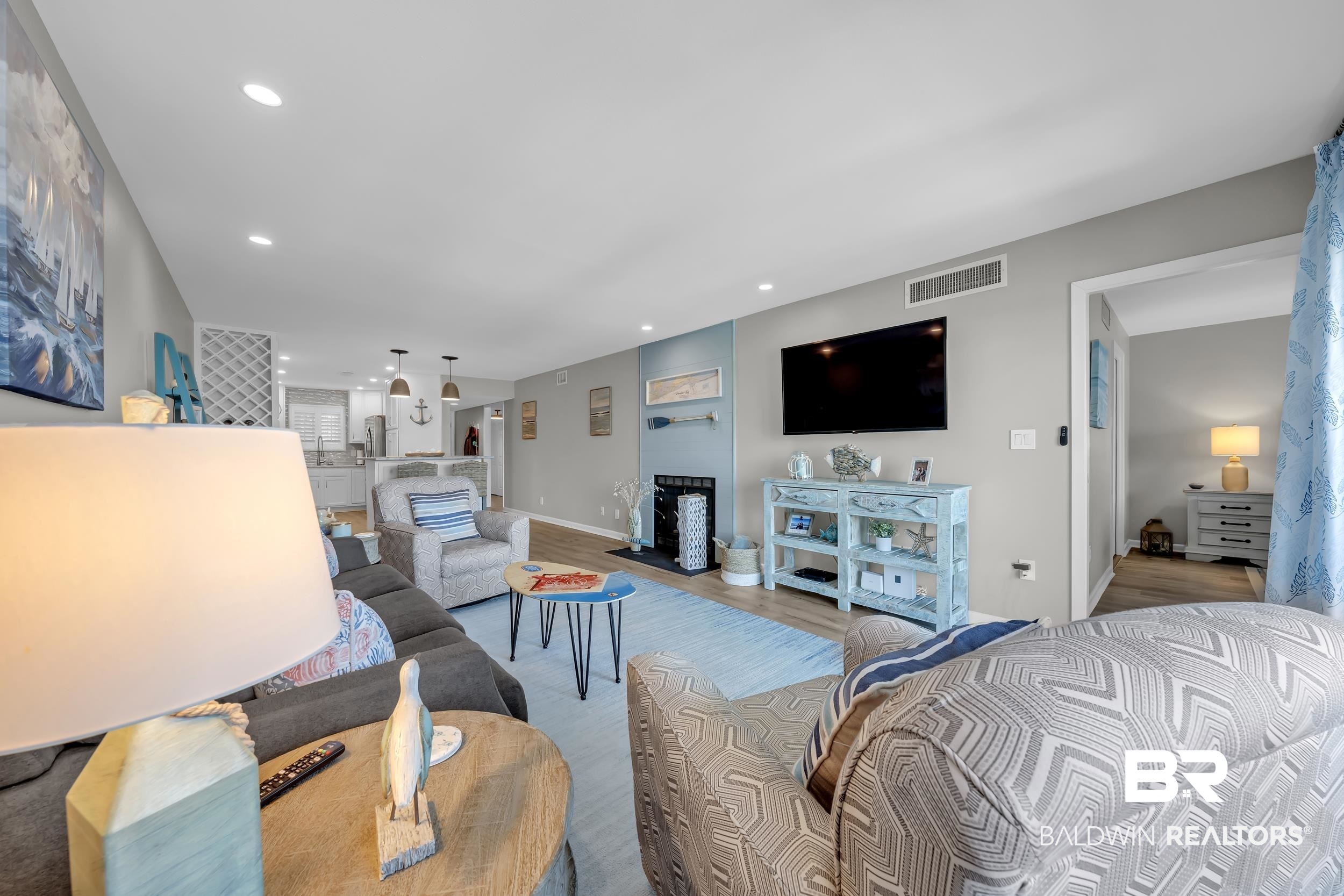 14100 River Road, Unit 211 Pensacola, FL 32507 - Photo 23 of 56 Open-concept living area featuring recessed lighting and wood-finish flooring
