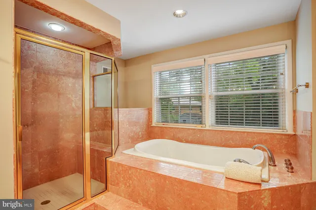 a front view of a house with a yard table and chairs