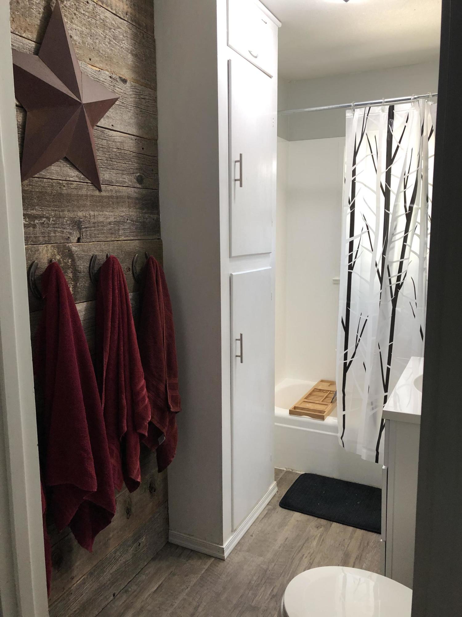 441 Upper Applegate Road Jacksonville, OR 97530 - Photo 20 of 25 a view of walk in closet with clothes and shoes