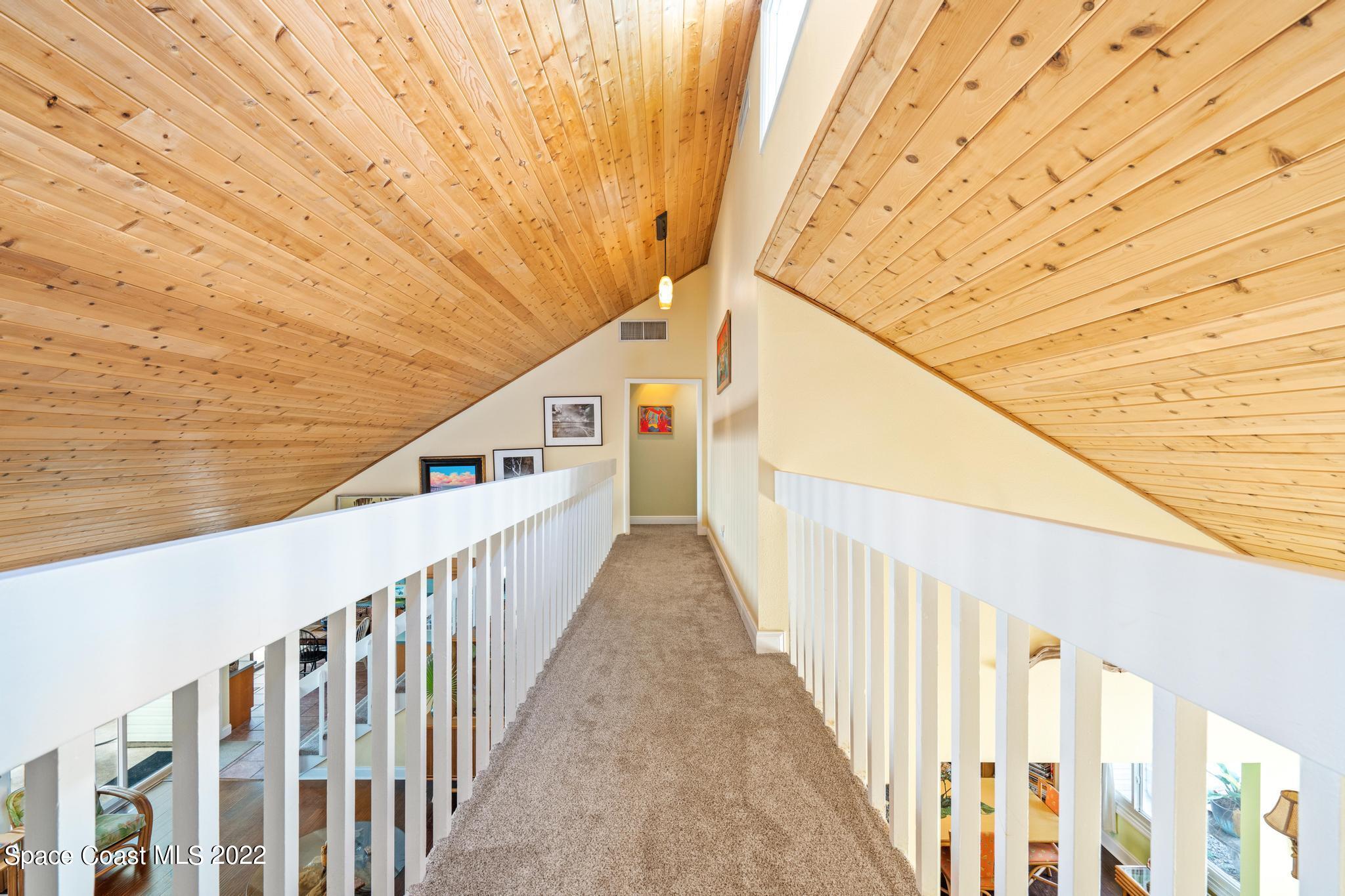 14 Country Club Road Cocoa Beach, FL 32931 - Photo 36 of 64 a view of balcony with wooden floor