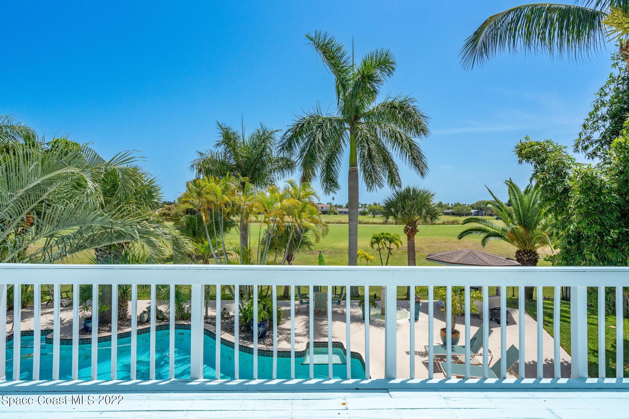 14 Country Club Road Cocoa Beach, FL 32931 - Photo 41 of 64 a view of balcony with a garden