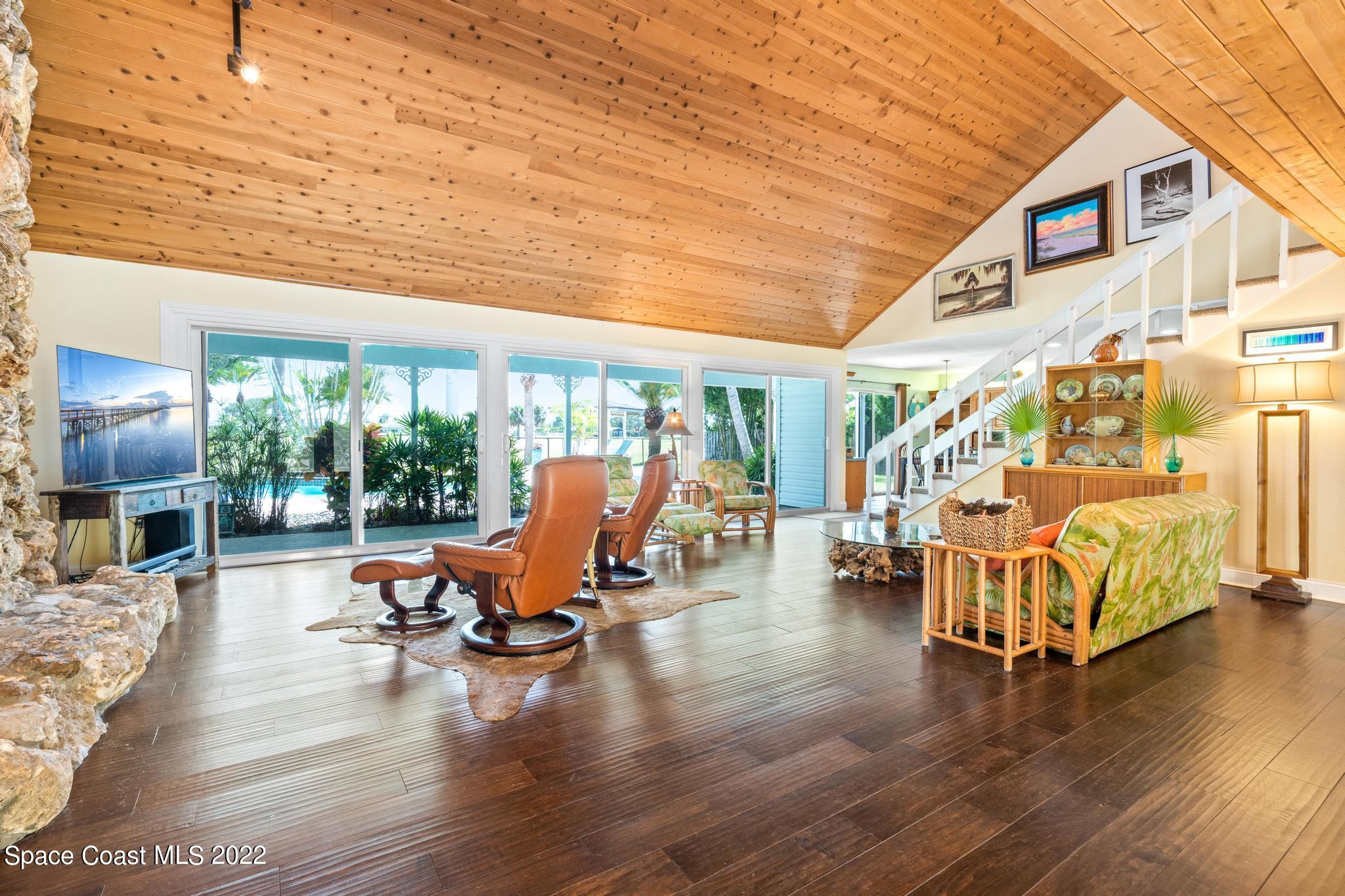 14 Country Club Road Cocoa Beach, FL 32931 - Photo 5 of 64 a view of a patio with table and chairs
