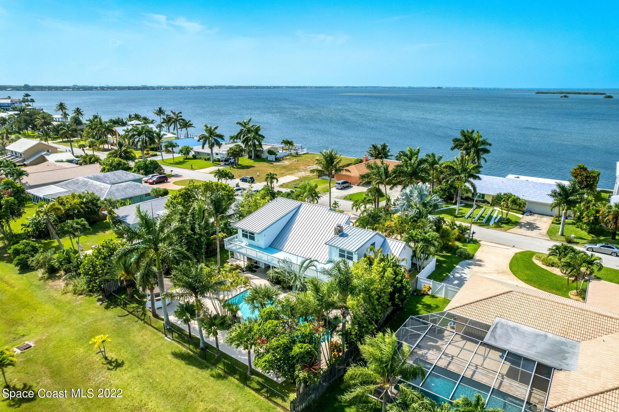 14 Country Club Road Cocoa Beach, FL 32931 - Photo 60 of 64 an aerial view of ocean with residential house ocean view