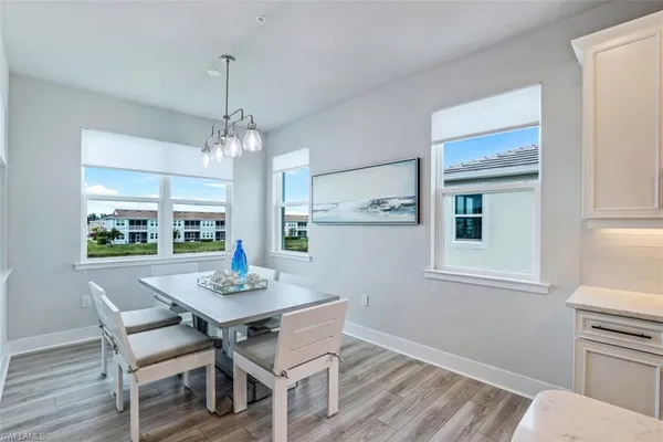 a room with a dresser and a mirror