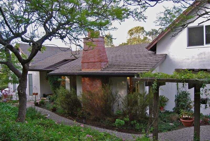 56 Conejo Road Santa Barbara, CA 93103 - Photo 1 of 8 a view of a house with a tub and trees around