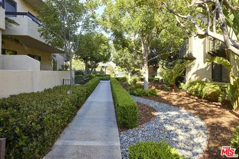 a view of a pathway with outside view