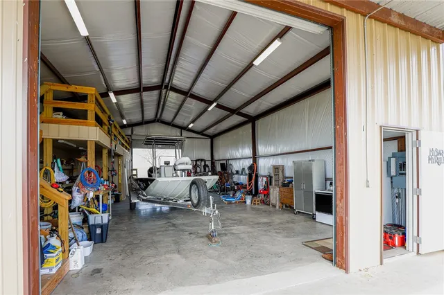 a view of an empty room with storage