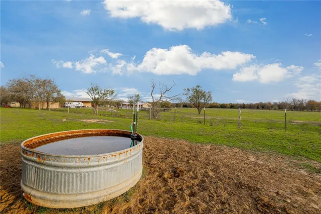 a view of a swimming pool with a balcony