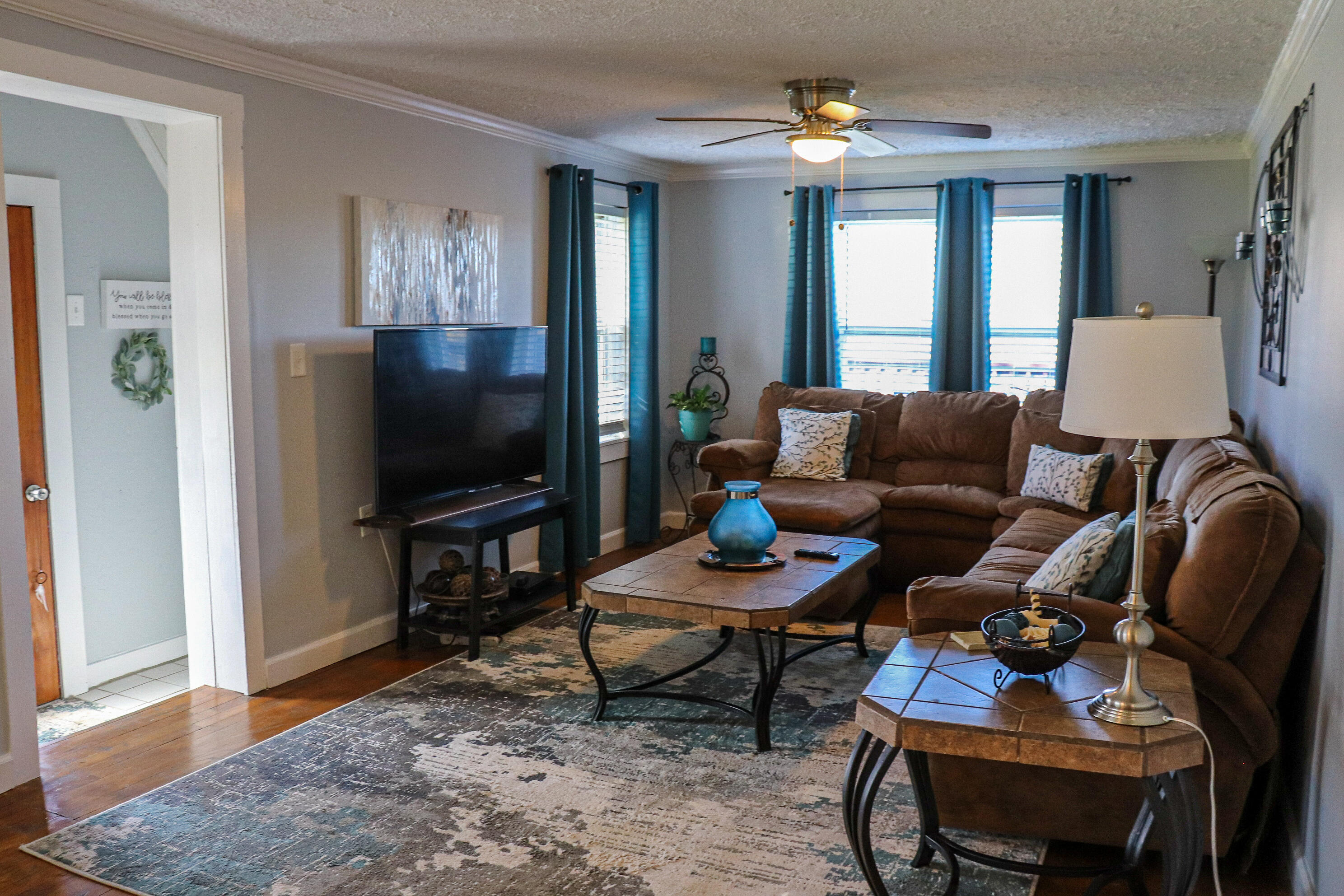 2663 Bethlehem Church Road Northeast Pilot, VA 24138 - Photo 11 of 24 a living room with furniture and a flat screen tv