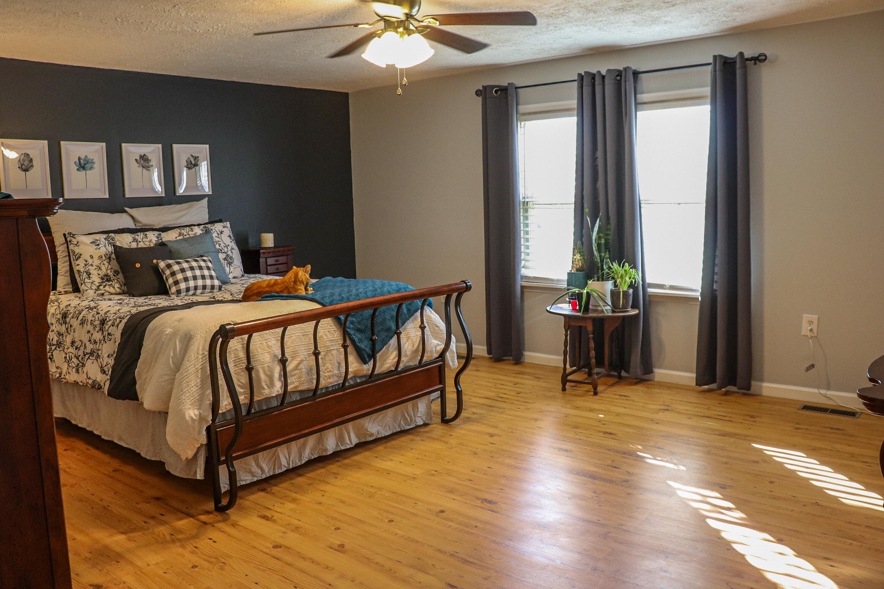 2663 Bethlehem Church Road Northeast Pilot, VA 24138 - Photo 14 of 24 a bedroom with a bed and a table in it