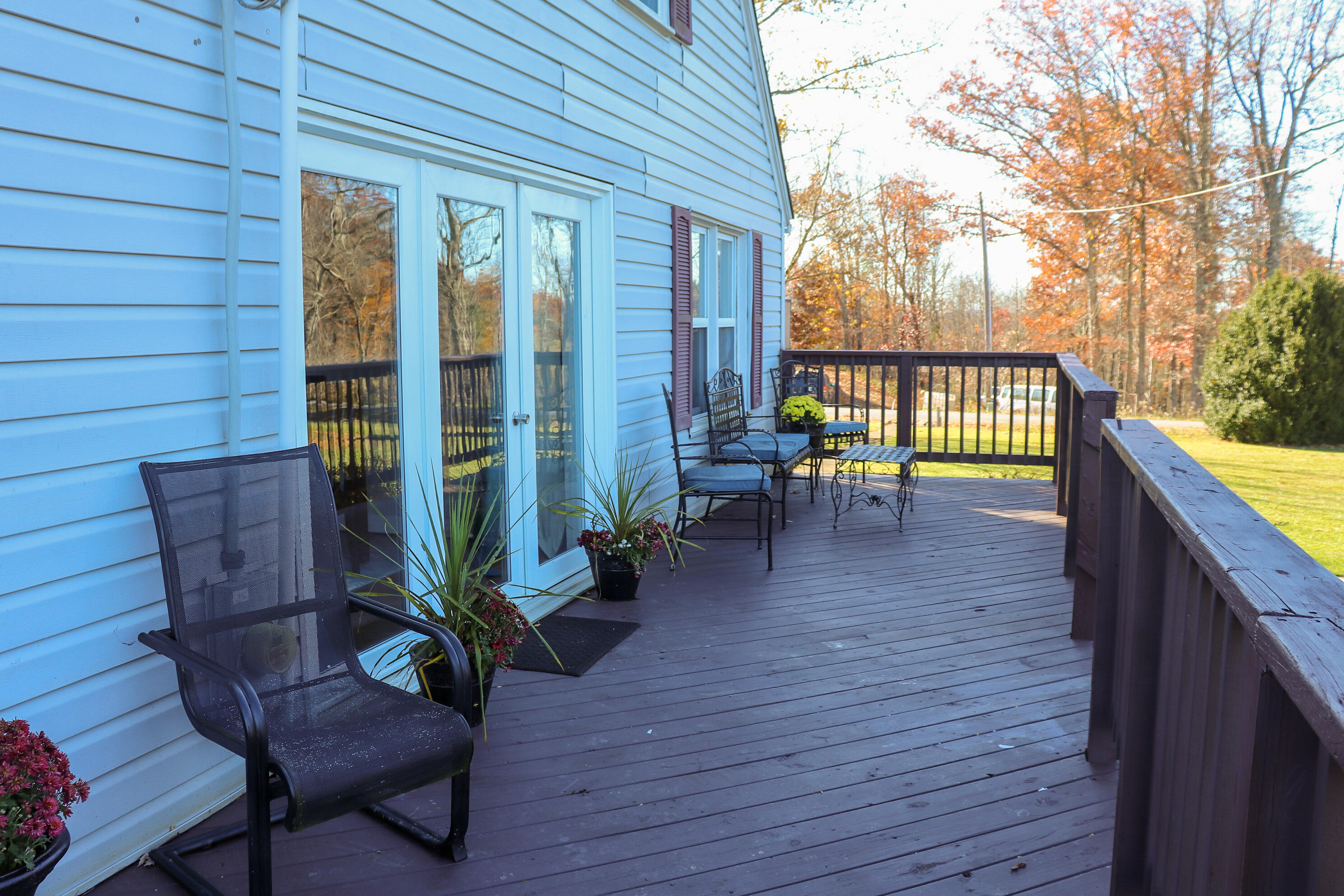 2663 Bethlehem Church Road Northeast Pilot, VA 24138 - Photo 21 of 24 a porch with chairs and wooden floor